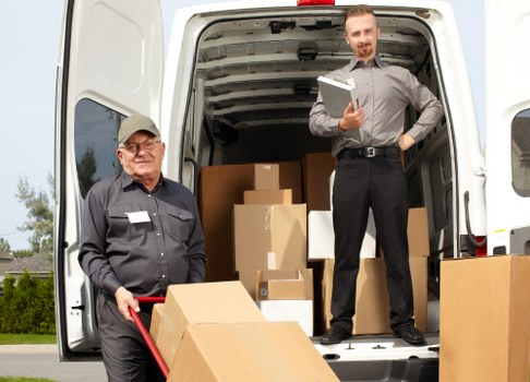 Professional movers handling office equipment in Storage Wandsworth