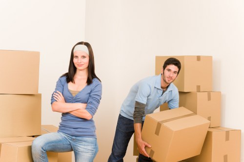 Efficient movers loading furniture into a truck